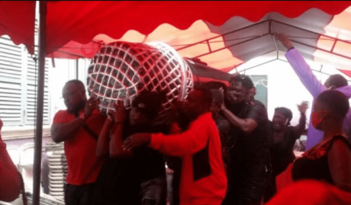 Castro's manager DJ Amess was buried in a microphone-carved coffin Castro's manager DJ Amess was buried in a microphone-carved coffin