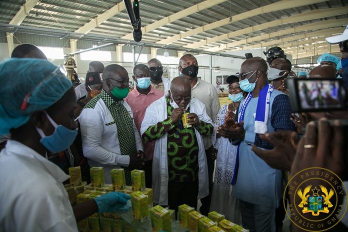 Akufo Addo tastes eku juice Akufo Addo tastes eku juice