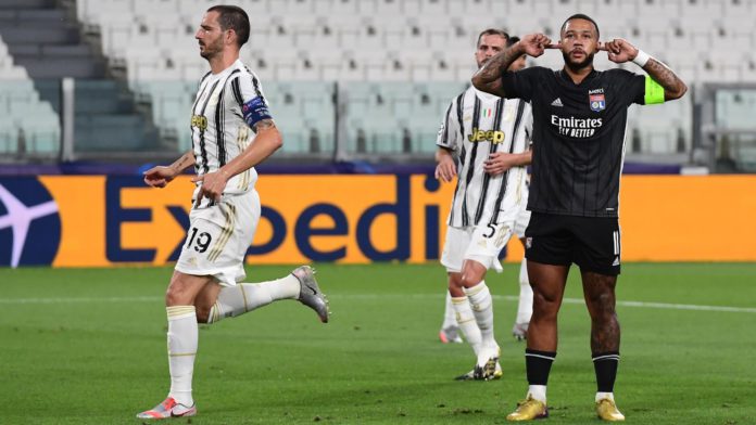 Lyon's Dutch forward Memphis Depay (R) celebrates scoring his team's first goal during the UEFA Champions League round of 16 second leg football match between Juventus and Olympique Lyonnais (OL), played behind closed doors due to the spread of the COVID- Image credit: Getty Images Lyon's Dutch forward Memphis Depay (R) celebrates scoring his team's first goal during the UEFA Champions League round of 16 second leg football match between Juventus and Olympique Lyonnais (OL), played behind closed doors due to the spread of the COVID- Image credit: Getty Images