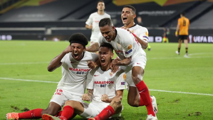 Sevilla's Argentinian midfielder Lucas Ocampos (C) celebrates scoring his team's first goal during the UEFA Europa League quarter-final football match Wolverhampton Wanderers v Sevilla at the MSV Arena on August 11, 2020 in Duisburg, western Germany. Image credit: Getty Images Sevilla's Argentinian midfielder Lucas Ocampos (C) celebrates scoring his team's first goal during the UEFA Europa League quarter-final football match Wolverhampton Wanderers v Sevilla at the MSV Arena on August 11, 2020 in Duisburg, western Germany. Image credit: Getty Images
