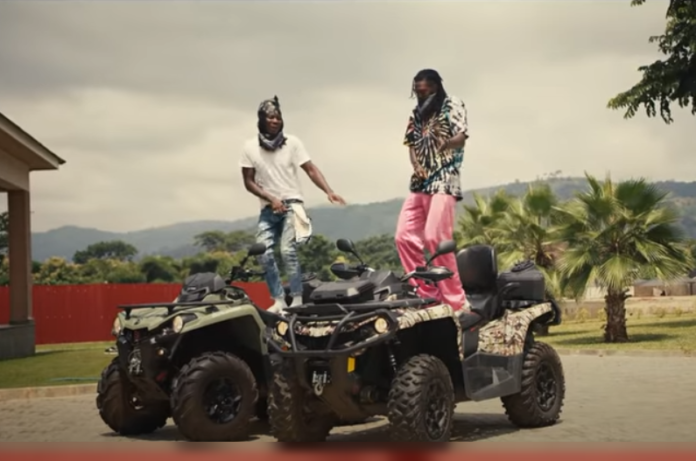 Stonebwoy and Emmanuel Adebayor in Putuu music video Stonebwoy and Emmanuel Adebayor in Putuu music video