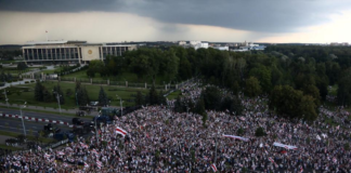 FILE PHOTO: Opposition supporters take part in a rally against presidential election results near the Independence Palace in Minsk, Belarus August 30, 2020. Tut.By via REUTERS
