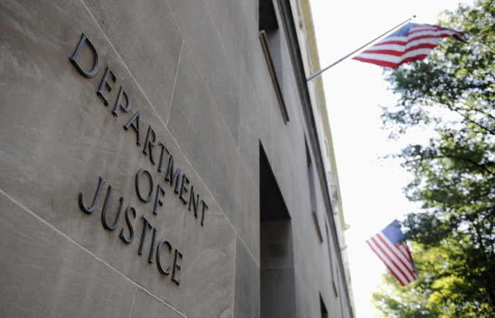 The exterior of the U.S. Department of Justice headquarters building in Washington. Photo by Jonathan Ernst The exterior of the U.S. Department of Justice headquarters building in Washington. Photo by Jonathan Ernst