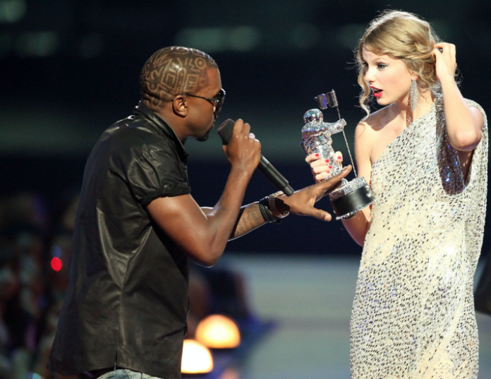 Kanye West and Taylor Swift at 2009 VMAs Kanye West and Taylor Swift at 2009 VMAs