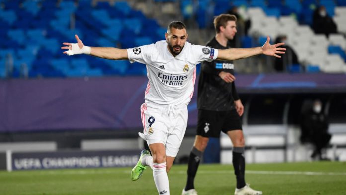 Real Madrid's French forward Karim Benzema celebrates after scoring during the UEFA Champions League group B football match between Real Madrid and Borussia Moenchengladbach at the Alfredo Di Stefano stadium in Valdebebas, northeast of Madrid, on December Image credit: Getty Images Real Madrid's French forward Karim Benzema celebrates after scoring during the UEFA Champions League group B football match between Real Madrid and Borussia Moenchengladbach at the Alfredo Di Stefano stadium in Valdebebas, northeast of Madrid, on December Image credit: Getty Images