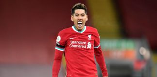 Liverpool's Brazilian midfielder Roberto Firmino celebrates scoring his team's second goal during the English Premier League football match between Liverpool and Tottenham Hotspur at Anfield in Liverpool, north west England on December 16, 2020. Image credit: Getty Images