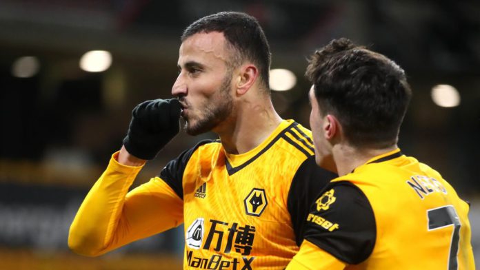 Romain Saiss of Wolverhampton Wanderers celebrates with teammate Pedro Neto after scoring their team's first goal during the Premier League match between Wolverhampton Wanderers and Tottenham Hotspur Image credit: Getty Images Romain Saiss of Wolverhampton Wanderers celebrates with teammate Pedro Neto after scoring their team's first goal during the Premier League match between Wolverhampton Wanderers and Tottenham Hotspur Image credit: Getty Images