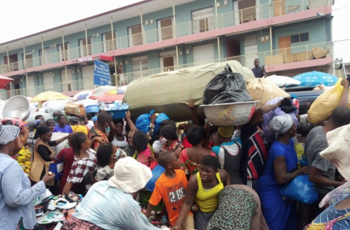 Shoppers on the street in front of the Makola Market in Accra. Shoppers on the street in front of the Makola Market in Accra.