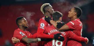 Manchester United's Portuguese midfielder Bruno Fernandes (C) celebrates with teammates after scoring their second goal from the penalty spot during the English Premier League football match between Manchester United and Aston Villa at Old Trafford in Man Image credit: Getty Images