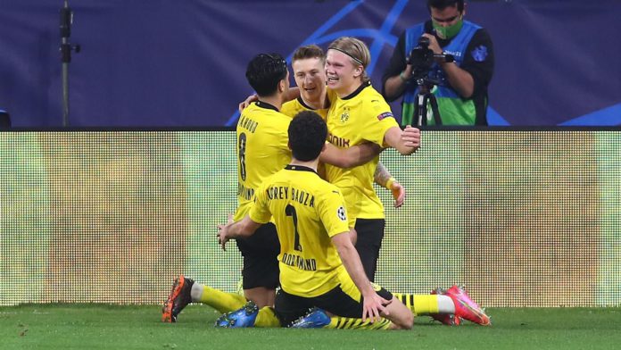 Erling Haaland (R) of Borussia Dortmund celebrates with Marco Reus and team mates after scoring their side's third goal during the UEFA Champions League Round of 16 match between Sevilla FC and Borussia Dortmund at Estadio Ramon Sanchez Pizjuan on Februa Image credit: Getty Images Erling Haaland (R) of Borussia Dortmund celebrates with Marco Reus and team mates after scoring their side's third goal during the UEFA Champions League Round of 16 match between Sevilla FC and Borussia Dortmund at Estadio Ramon Sanchez Pizjuan on Februa Image credit: Getty Images