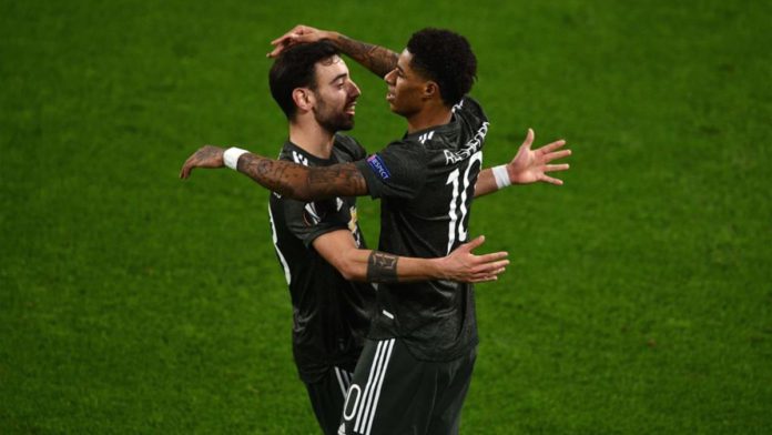Marcus Rashford of Manchester United (R) celebrates a goal with teammate Bruno Fernandes Image credit: Getty Images Marcus Rashford of Manchester United (R) celebrates a goal with teammate Bruno Fernandes Image credit: Getty Images