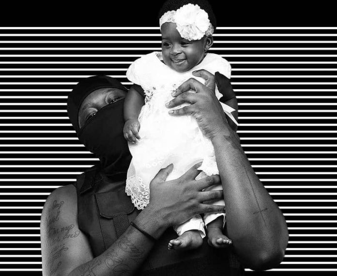 Fella Makafui, hubby finally show off daughter's face