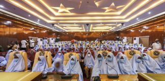 The girls gathered at a state government building following their release
