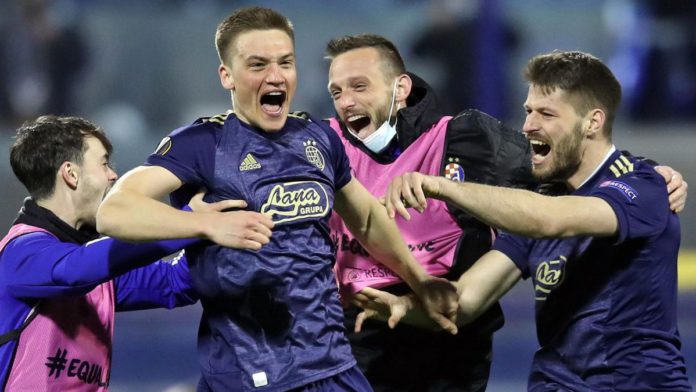 Dinamo Zagreb's players celebrate their 3-0 victory at the end of the UEFA Europa League round of 16 Image credit: Getty Images Dinamo Zagreb's players celebrate their 3-0 victory at the end of the UEFA Europa League round of 16 Image credit: Getty Images
