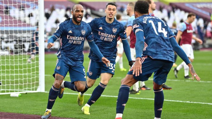 Alexandre Lacazette of Arsenal celebrates with Gabriel Martinelli and Pierre Emerick Aubameyang after scoring their side's third goal during the Premier League match between West Ham United and Arsenal Image credit: Getty Images Alexandre Lacazette of Arsenal celebrates with Gabriel Martinelli and Pierre Emerick Aubameyang after scoring their side's third goal during the Premier League match between West Ham United and Arsenal Image credit: Getty Images