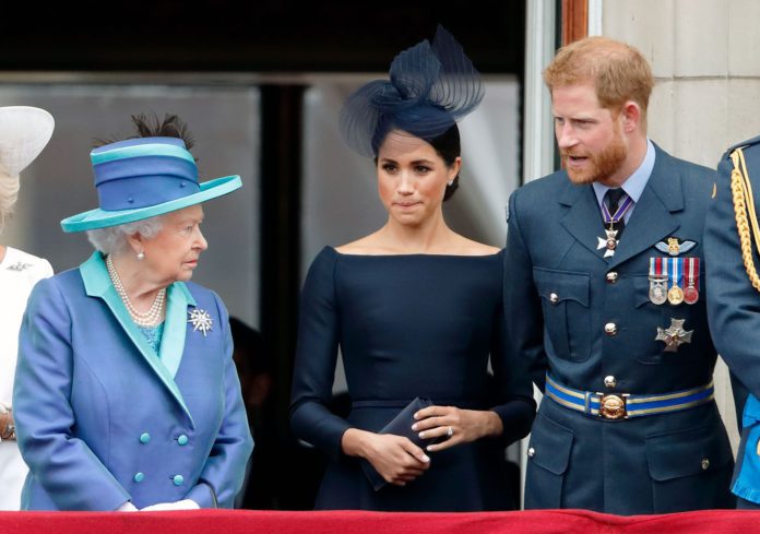 L-R: Queen Elizabeth, Meghan Markle, and Prince Harry. Photo: Getty Images L-R: Queen Elizabeth, Meghan Markle, and Prince Harry. Photo: Getty Images
