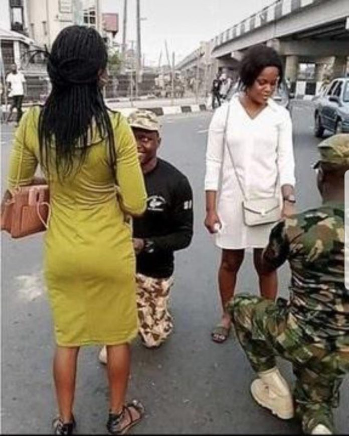 Heavy traffic as two soldiers 'storm' street for proposal