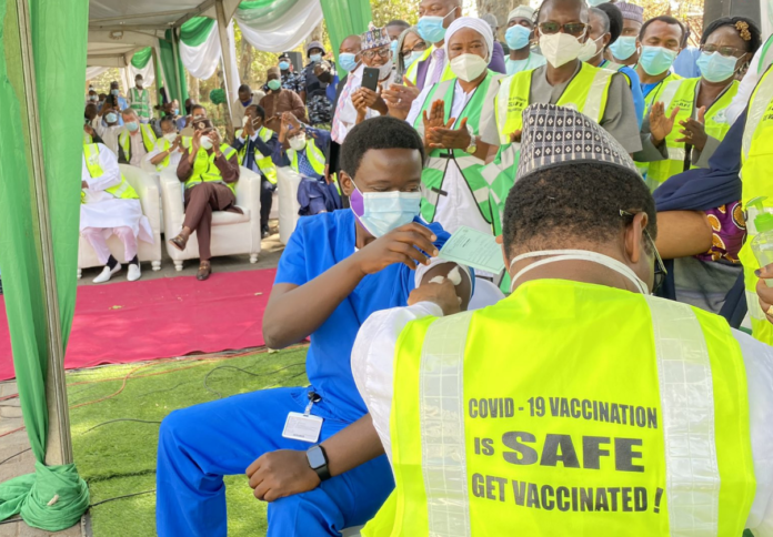 Nigeria begins Covid-19 vaccination as health workers take their first shots