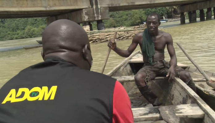 Adom TV's Kobby Stonne interviews a River Ankobra fisherman Adom TV's Kobby Stonne interviews a River Ankobra fisherman