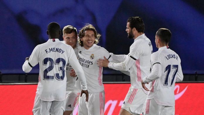 Real Madrid's German midfielder Toni Kroos (2L) celebrates with teammates after scoring during the "El Clasico" Spanish League football match between Real Madrid CF and FC Barcelona at the Alfredo di Stefano stadium in Valdebebas, on the outskirts of Madrid Image credit: Getty Images Real Madrid's German midfielder Toni Kroos (2L) celebrates with teammates after scoring during the "El Clasico" Spanish League football match between Real Madrid CF and FC Barcelona at the Alfredo di Stefano stadium in Valdebebas, on the outskirts of Madrid Image credit: Getty Images