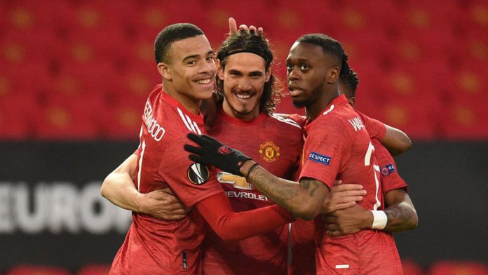 Manchester United's Uruguayan striker Edinson Cavani (C) celebrates with teammates after scoring the opening goal of the UEFA Europa league quarter final, second leg football match between Manchester United and Granada at Old Trafford Image credit: Getty Images Manchester United's Uruguayan striker Edinson Cavani (C) celebrates with teammates after scoring the opening goal of the UEFA Europa league quarter final, second leg football match between Manchester United and Granada at Old Trafford Image credit: Getty Images