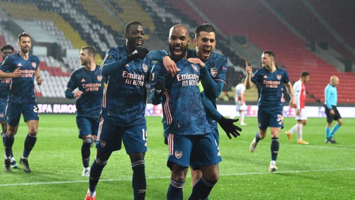 Alex Lacazette celebrates scoring the 2nd Arsenal goal with (L) Nicolas Pepe and (R) Dani Ceballos during the UEFA Europa League Quarter Final Second Leg match between Slavia Praha and Arsenal at Sinobo Stadium Image credit: Getty Images Alex Lacazette celebrates scoring the 2nd Arsenal goal with (L) Nicolas Pepe and (R) Dani Ceballos during the UEFA Europa League Quarter Final Second Leg match between Slavia Praha and Arsenal at Sinobo Stadium Image credit: Getty Images
