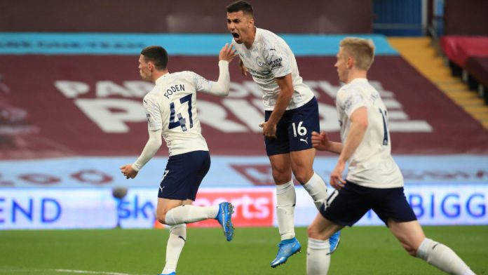 Phil Foden of Manchester City celebrates with Rodrigo after scoring their side's first goal during the Premier League match between Aston Villa and Manchester City at Villa Park on April 21, 2021 in Birmingham, England. Image credit: Getty Images Phil Foden of Manchester City celebrates with Rodrigo after scoring their side's first goal during the Premier League match between Aston Villa and Manchester City at Villa Park on April 21, 2021 in Birmingham, England. Image credit: Getty Images