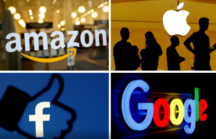 FILE PHOTO: The logos of Amazon, Apple, Facebook and Google