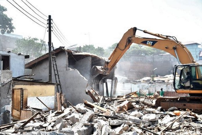 File photo of a demolished building File photo of a demolished building