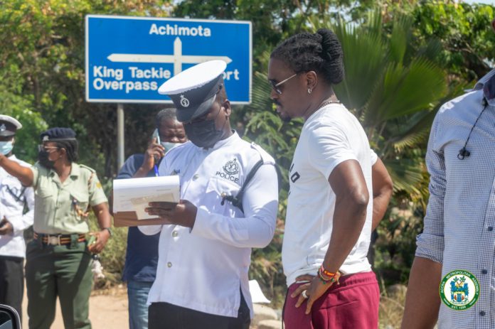 Derek Boateng with a Police Officer Derek Boateng with a Police Officer