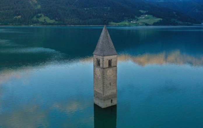Italy town Lake Resia as it normally appears
