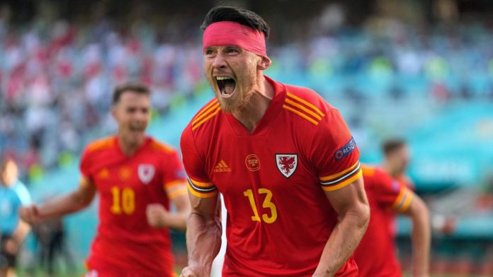 Wales' midfielder Kieffer Moore celebrates after scoring the equaliser during the UEFA EURO 2020 Group A football match between Wales and Switzerland at the Olympic Stadium in Baku on June 12, 2021. Image credit: Getty Images Wales' midfielder Kieffer Moore celebrates after scoring the equaliser during the UEFA EURO 2020 Group A football match between Wales and Switzerland at the Olympic Stadium in Baku on June 12, 2021. Image credit: Getty Images