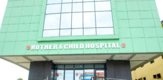 Doctors at Mother & Child Hospital operate with rechargeable lamps