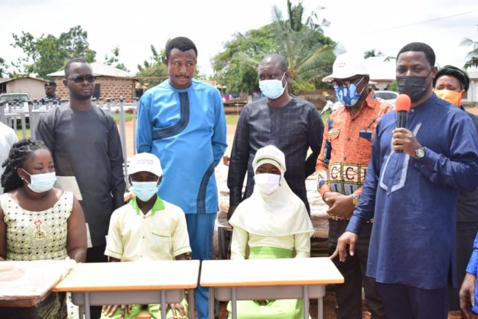 Western Regional Minister donates desks, chairs to school