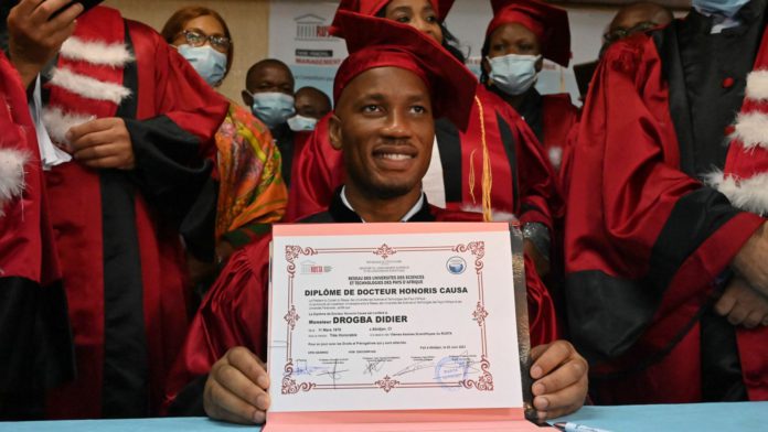 Didier Drogba poses for a photograph after receiving an Honorary degree from the University of Sciences and Technology of Africa network (RUSTA) in Abidjan Didier Drogba poses for a photograph after receiving an Honorary degree from the University of Sciences and Technology of Africa network (RUSTA) in Abidjan