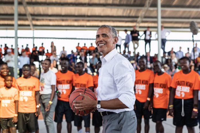 US Barack Obama in action on the basketball court US Barack Obama in action on the basketball court