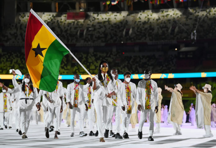 TOKYO, JAPAN - JULY 23: Flag bearers Nadia Eke and Sulemanu Tetteh of Team Ghana lead their team during the Opening Ceremony of the Tokyo 2020 Olympic Games at Olympic Stadium on July 23, 2021 in Tokyo, Japan. (Photo by Matthias Hangst/Getty Images) TOKYO, JAPAN - JULY 23: Flag bearers Nadia Eke and Sulemanu Tetteh of Team Ghana lead their team during the Opening Ceremony of the Tokyo 2020 Olympic Games at Olympic Stadium on July 23, 2021 in Tokyo, Japan. (Photo by Matthias Hangst/Getty Images)