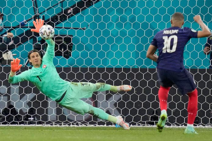 Yann Sommer saves Kylian Mbappe's penalty Yann Sommer saves Kylian Mbappe's penalty