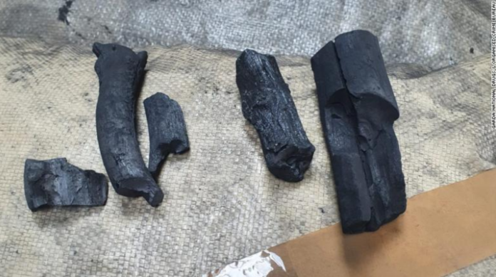The cocaine was made to look like charcoal. The cocaine was made to look like charcoal.