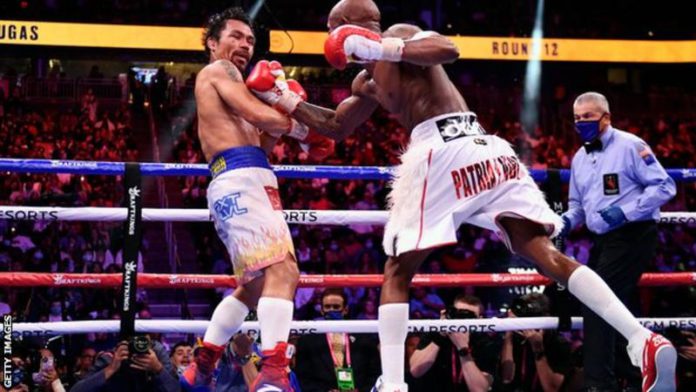 Manny Pacquiao (left) last fought in July 2019 Manny Pacquiao (left) last fought in July 2019