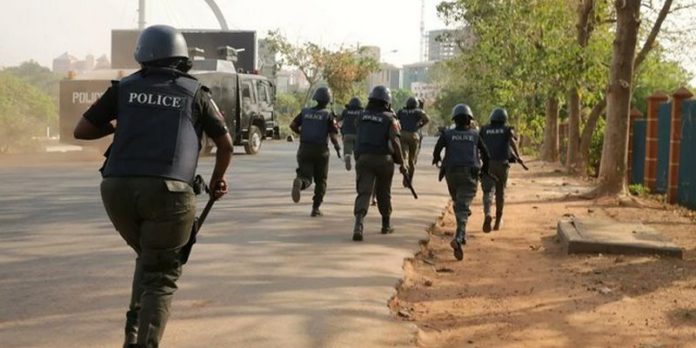 policemen run for their lives