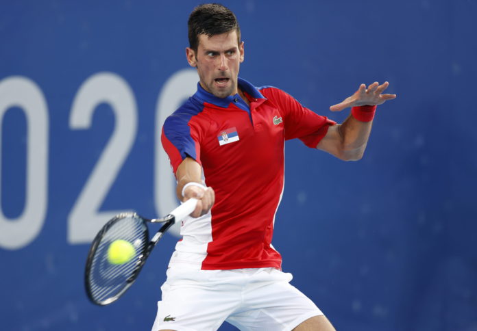 Novak Djokovic of Serbia in action during the Tennis Men's Singles Third Round between Novak Djokovic of Serbia and Alejandro Davidovich Fokina of Spain of the Tokyo 2020 Olympic Games at the Ariake Coliseum in Tokyo, Japan, 28 July 2021. EPA/RUNGROJ YONGRIT