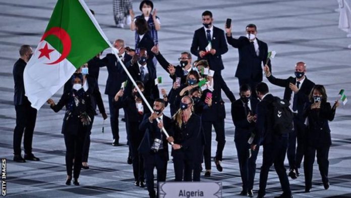 Nourine announced his withdrawal shortly before his team-mates joined the opening ceremony at the Olympics Nourine announced his withdrawal shortly before his team-mates joined the opening ceremony at the Olympics