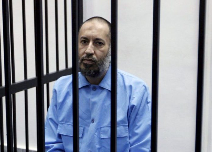Saadi Gaddafi was cleared of killing the Libyan football coach, and targeting protesters Saadi Gaddafi was cleared of killing the Libyan football coach, and targeting protesters