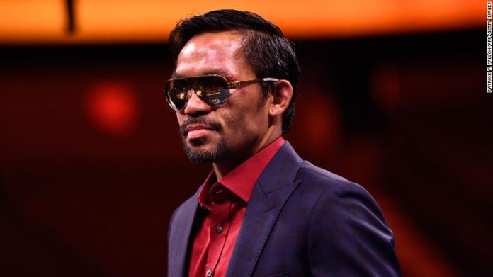 Manny Pacquiao of the Philippines speaks during a press conference after his defeat to Cuba's Yordenis Ugas in the WBA Welterweight Championship boxing match in Las Vegas in August. Manny Pacquiao of the Philippines speaks during a press conference after his defeat to Cuba's Yordenis Ugas in the WBA Welterweight Championship boxing match in Las Vegas in August.