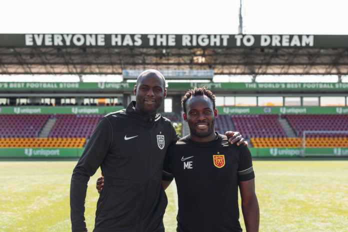 Djimi Traore with Michael Essien Djimi Traore with Michael Essien