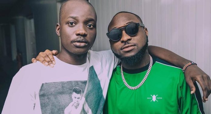 Davido and his photographer, Fortune