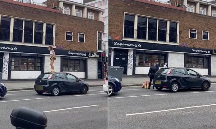 driver punches woman
