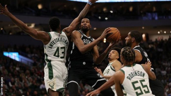 Reigning champions Milwaukee Bucks started their title defence with victory over Brooklyn Nets Reigning champions Milwaukee Bucks started their title defence with victory over Brooklyn Nets