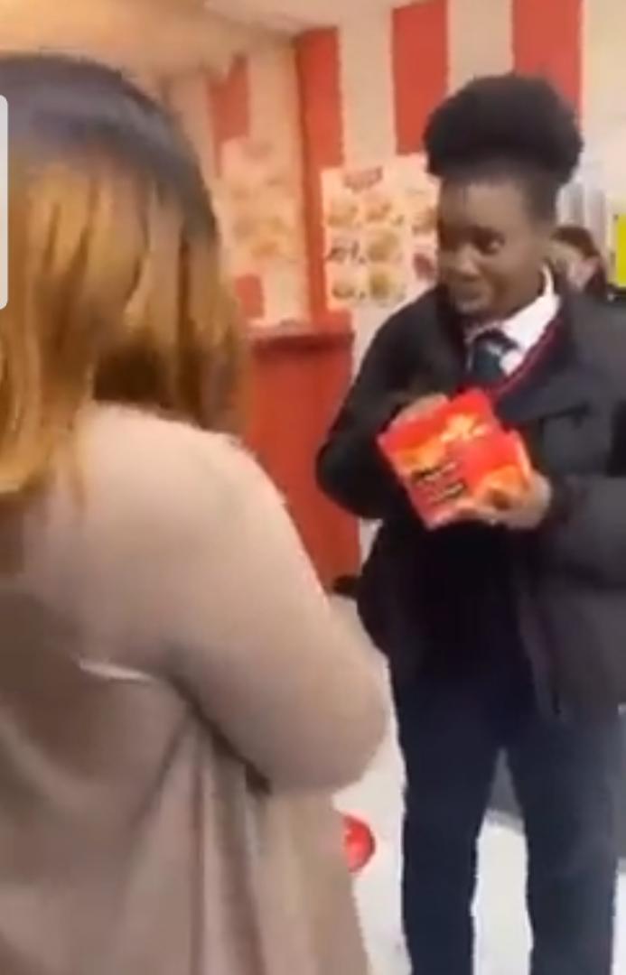 African woman captured on viral video slapping young girl